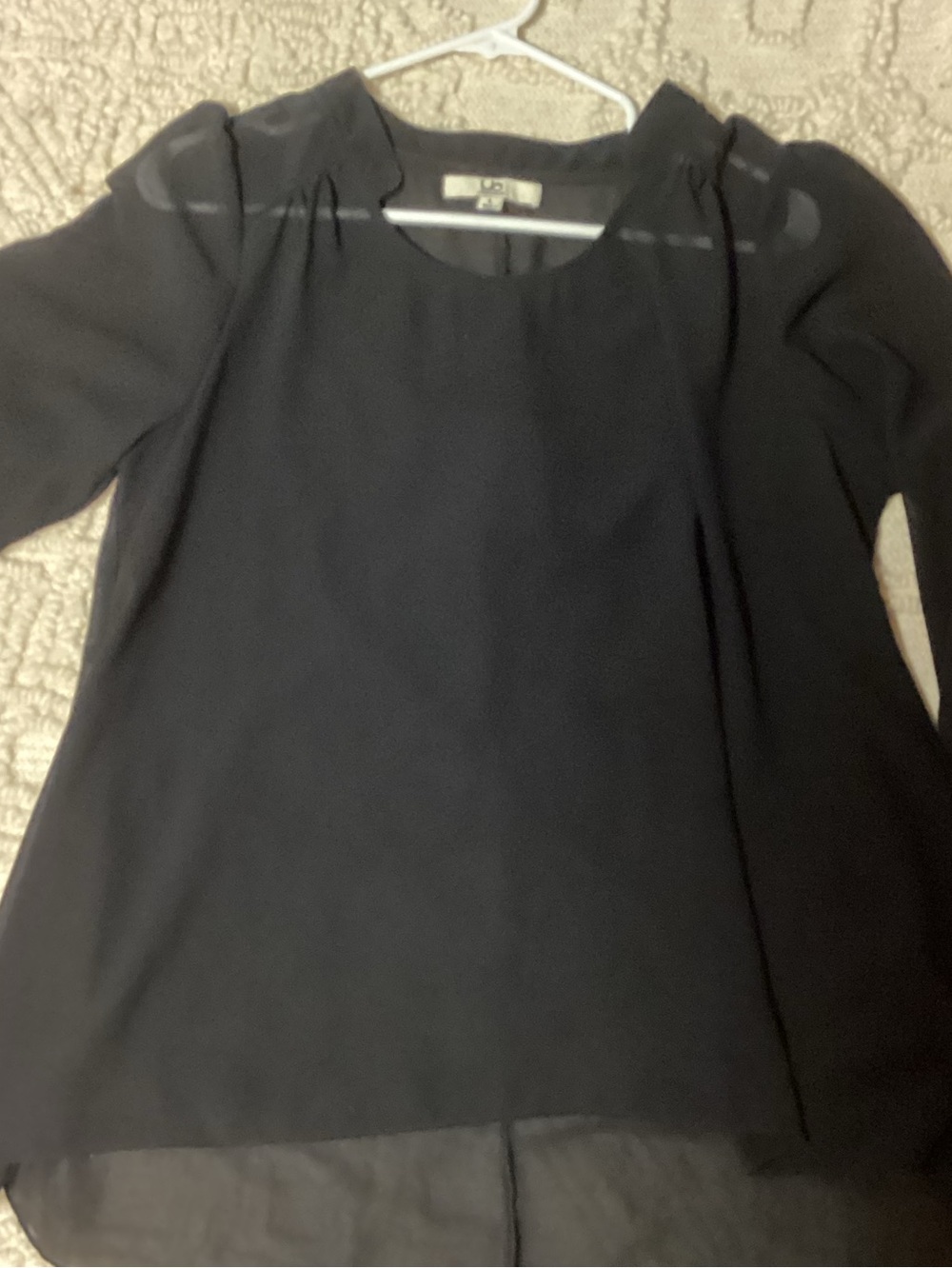 Ya, black sheer blouse, size large.